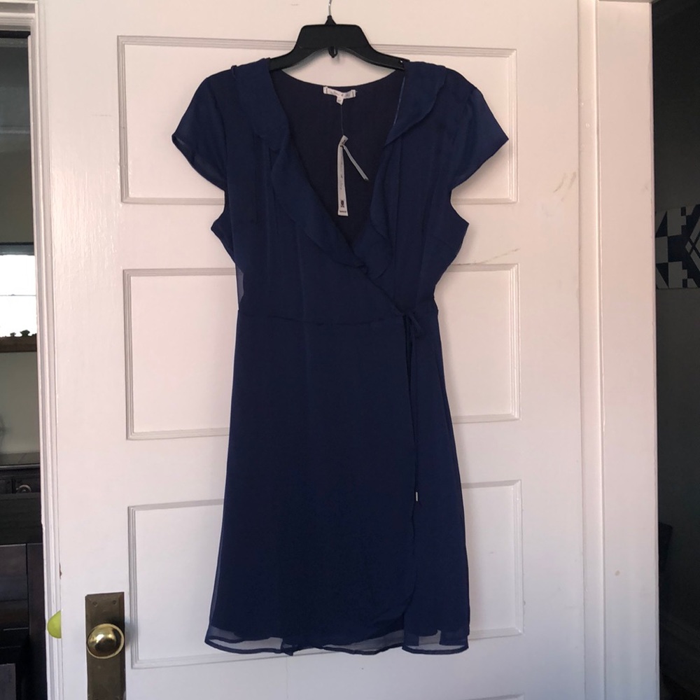 Navy tie, crossover dress.